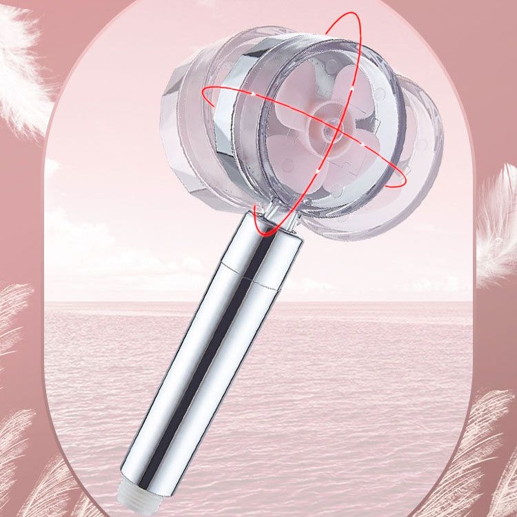 Set with round silver handheld shower head for wall mounting