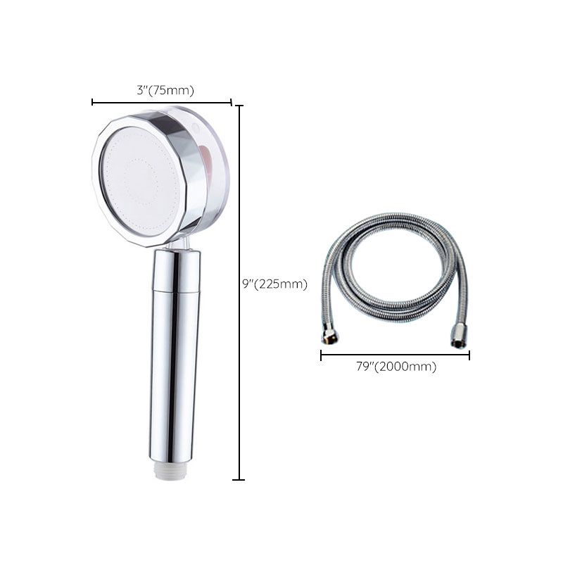Set with round silver handheld shower head for wall mounting