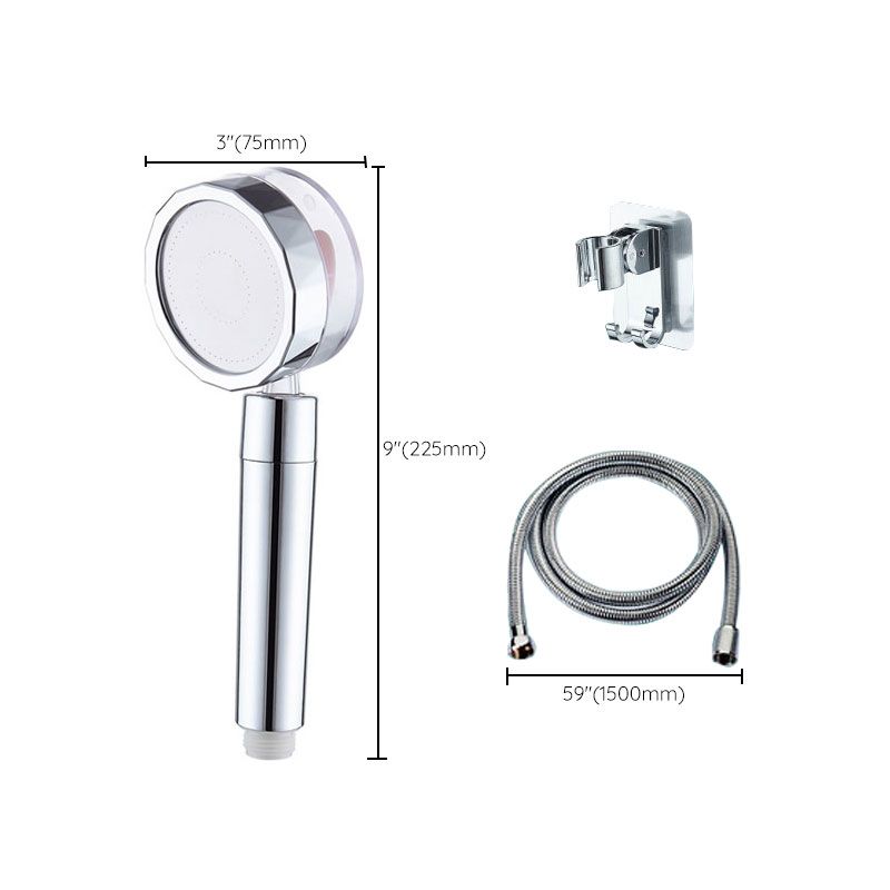 Set with round silver handheld shower head for wall mounting