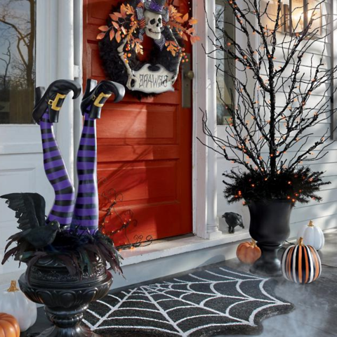 Witch Leg Stakes – Halloween Garden Decoration with Striped Stockings & Buckled Boots
