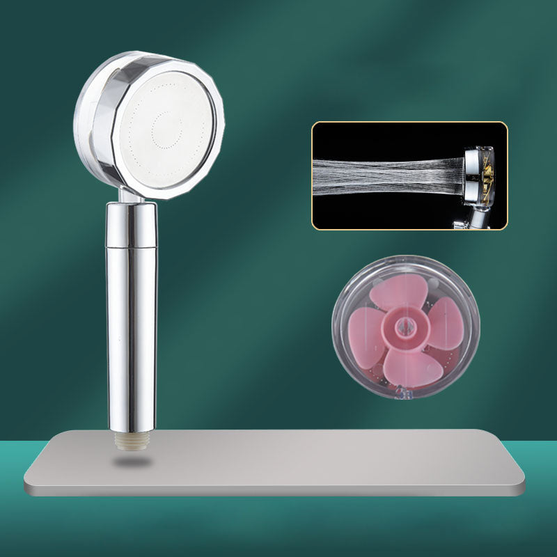Set with round silver handheld shower head for wall mounting