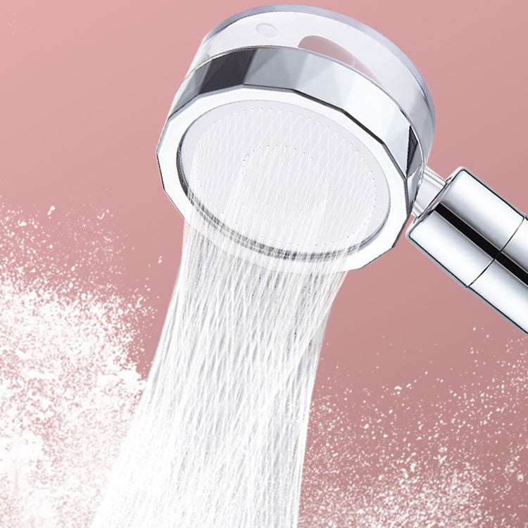 Set with round silver handheld shower head for wall mounting