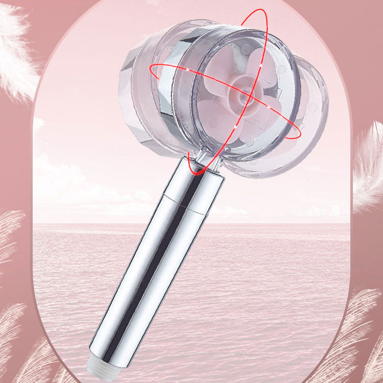 Set with round silver handheld shower head for wall mounting