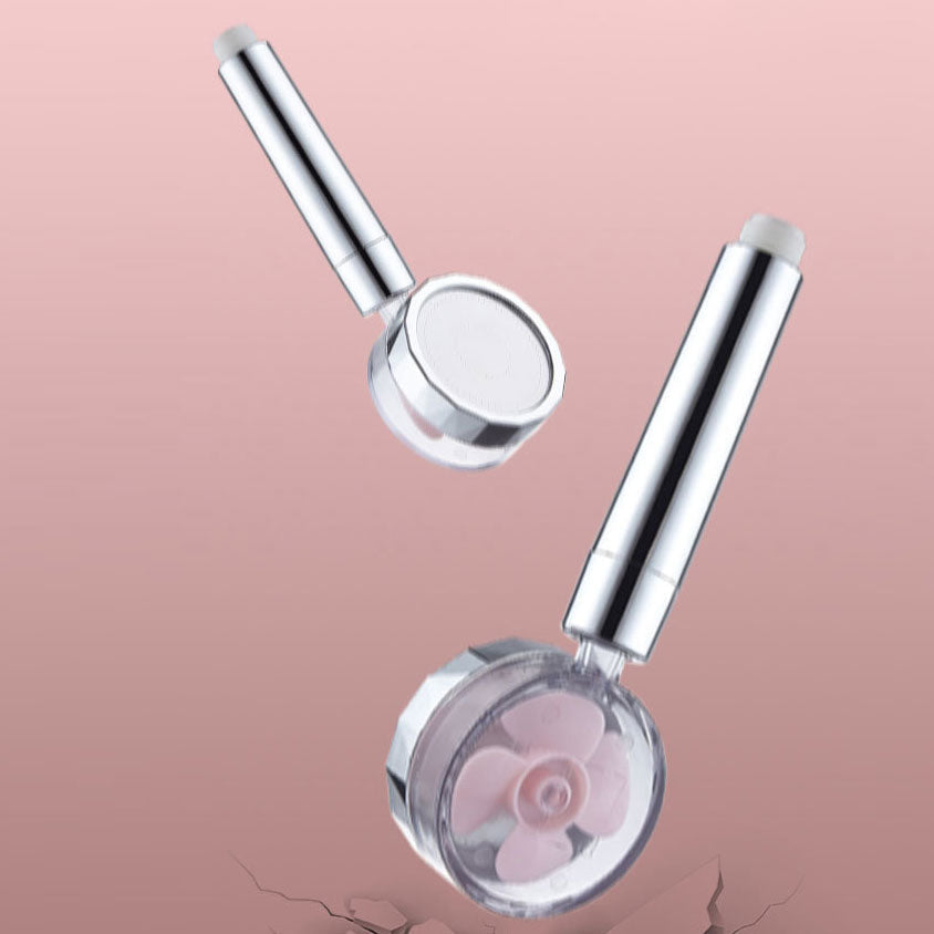 Set with round silver handheld shower head for wall mounting