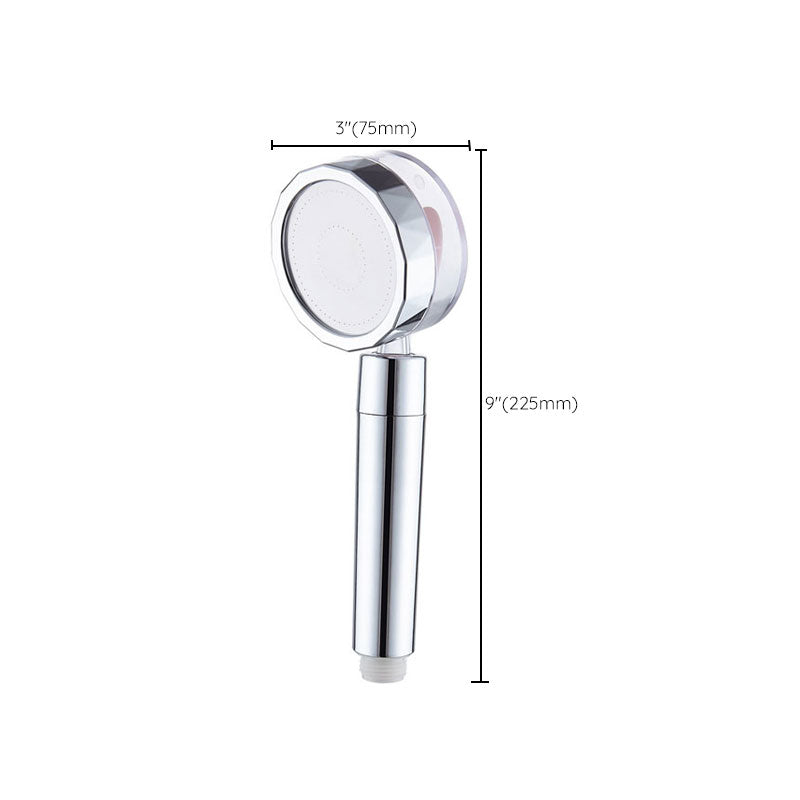 Set with round silver handheld shower head for wall mounting