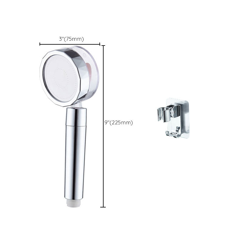 Set with round silver handheld shower head for wall mounting