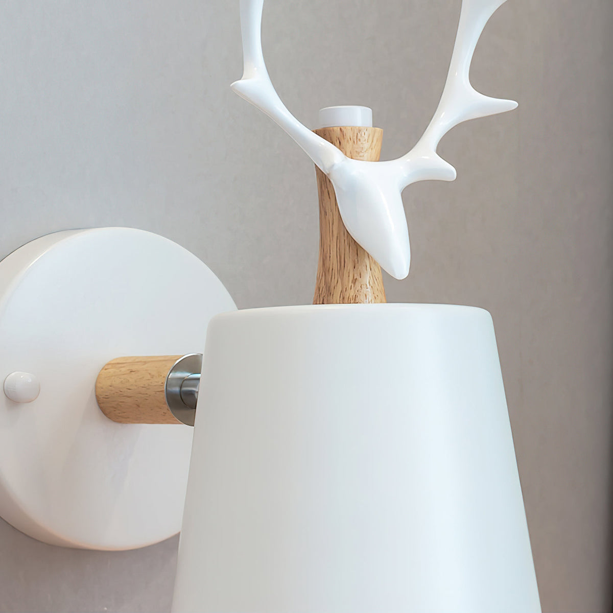 Antler wall sconce