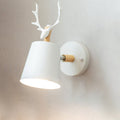 Antler wall sconce