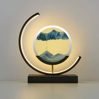 LED sand art table lamp with circular frame