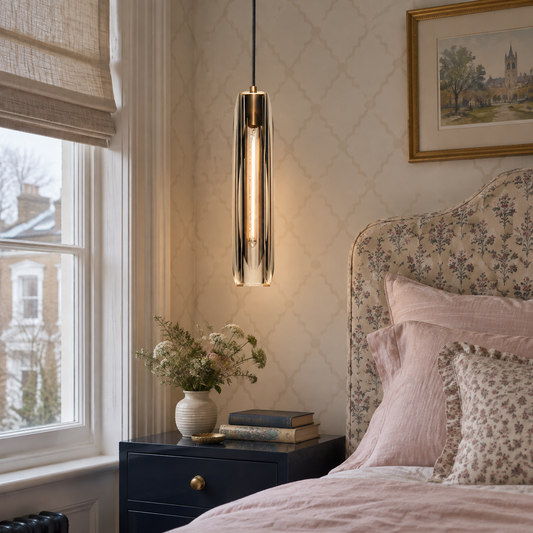 Slim crystal pendant light as a bedside light in an Edwardian bedroom