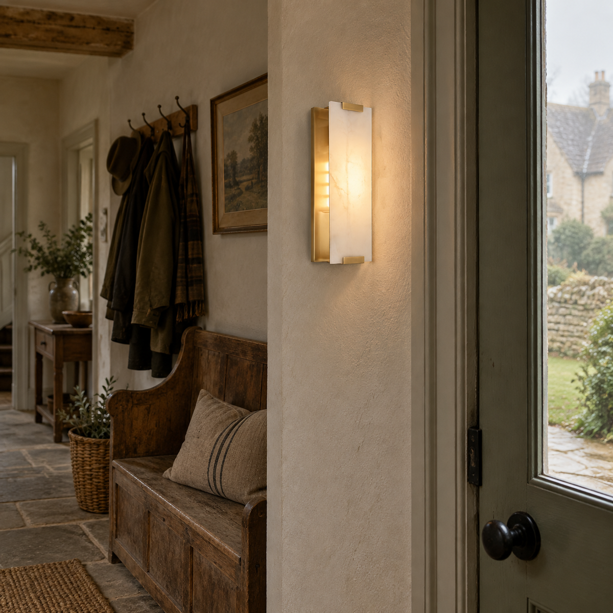 Natural stone alabaster wall sconce in a Cotswold hallway