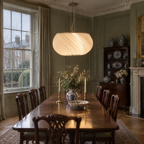Acrylic chandelier over a Georgian dining table