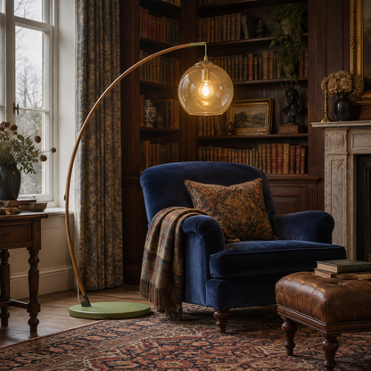Glass and wood arc floor lamp in an Edwardian library