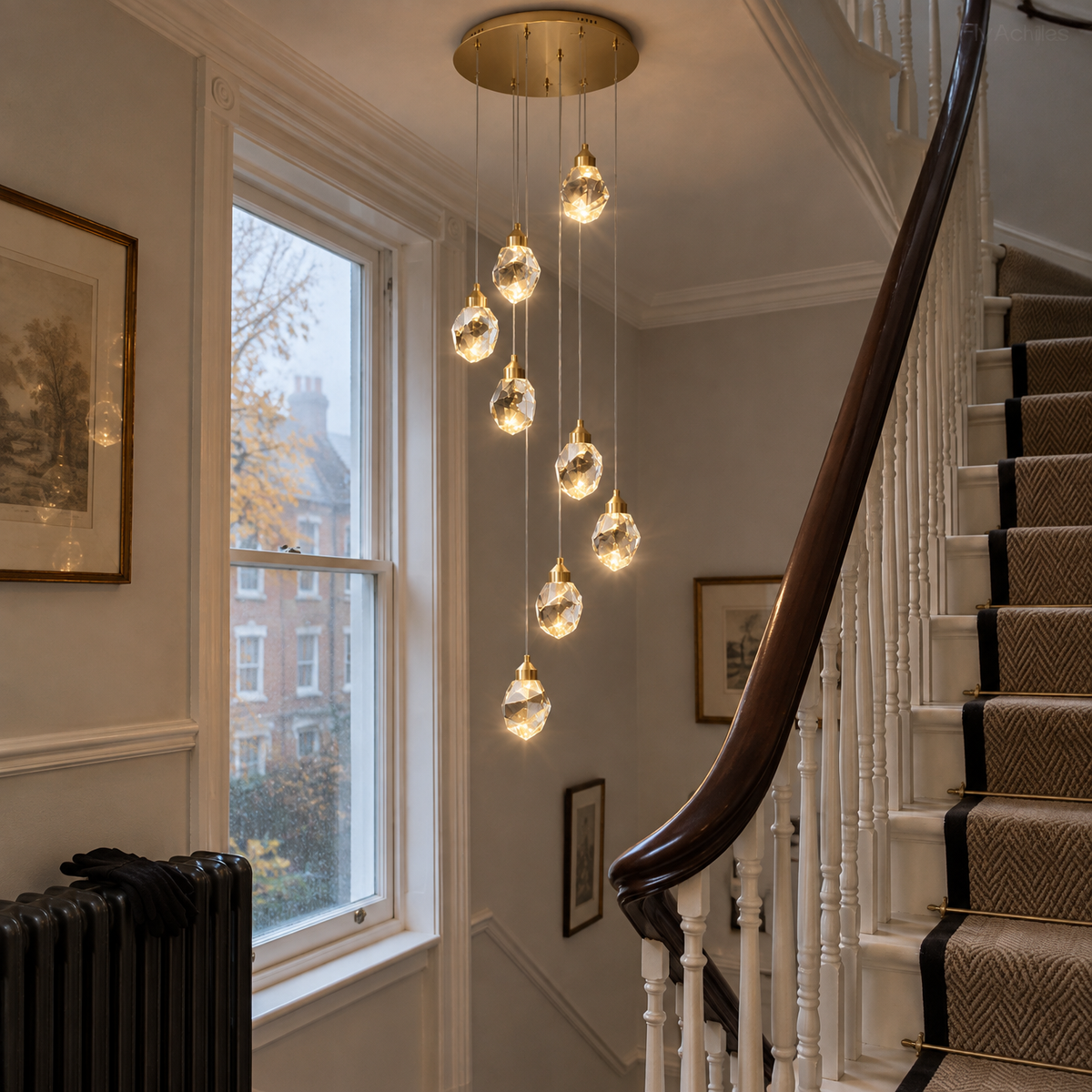 Brass crystal pendant light in a Victorian stairwell