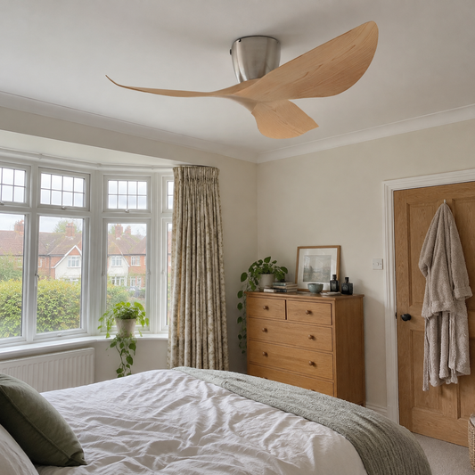 Ceiling fan mounted in a bedroom