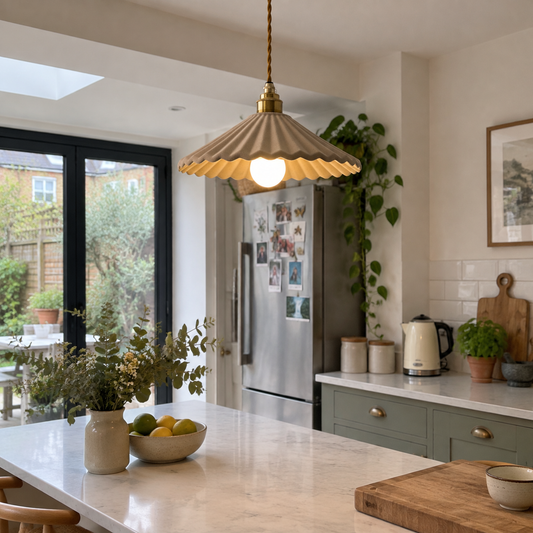 Fluted ceramic pendant light over a kitchen island