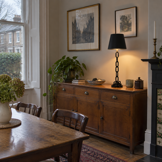 Chain link table lamp on a sideboard