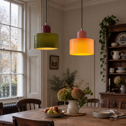 Coloured glass pendant light over a dining table