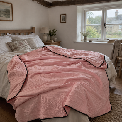Breathable cooling blanket on a bed