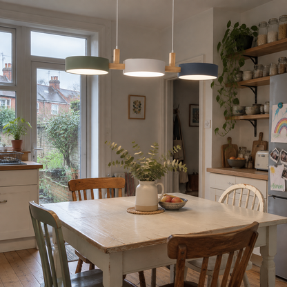 Scandinavian cylinder pendant over a kitchen table
