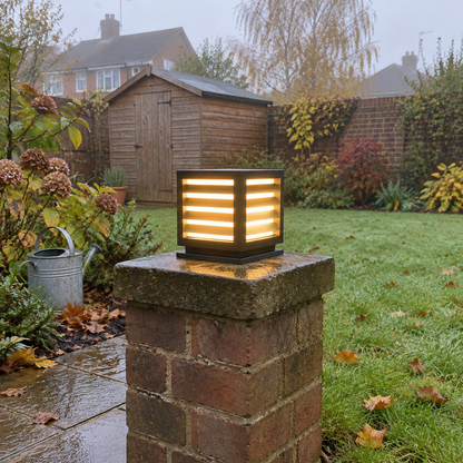 Outdoor LED pillar light on a garden path