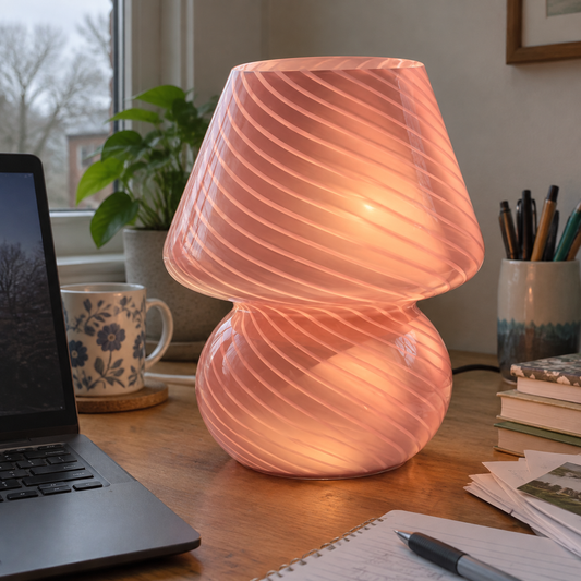 Glass mushroom table lamp on a study desk