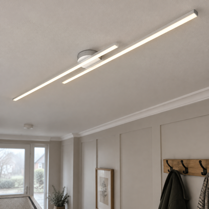 Modern aluminium linear LED ceiling light fixed flat across a British hallway ceiling