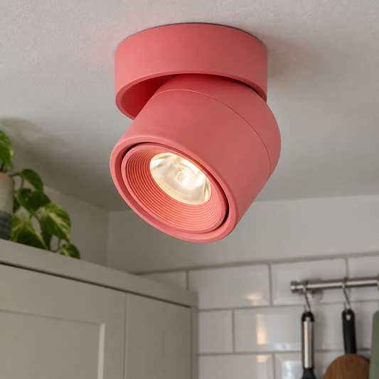 Small colourful macaron LED ceiling spot lights mounted on a British kitchen ceiling