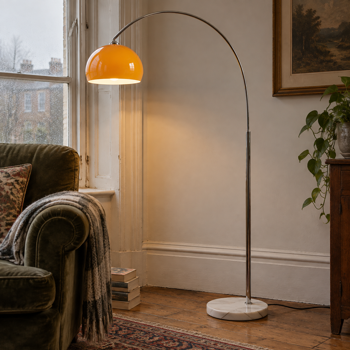 Marble and glass mid-century floor lamp standing beside an armchair in a British sitting room