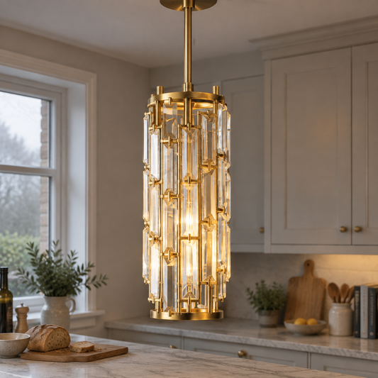 Mini crystal pendant light hanging above a kitchen island in a British home