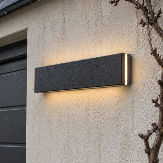 Waterproof linear LED outdoor wall sconce lit horizontally on rain-streaked render