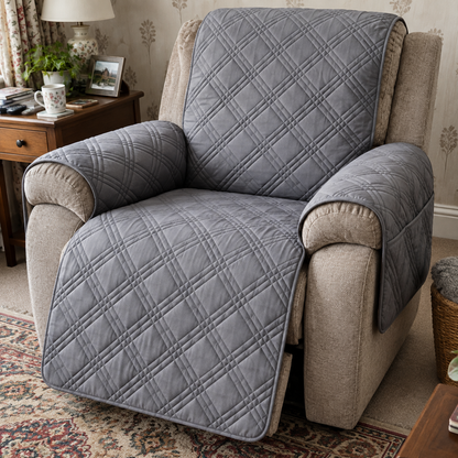 Waterproof quilted recliner chair cover fitted over an armchair in a sitting room