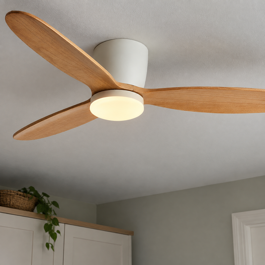 Small ceiling fan with an integrated light fitted to a bedroom ceiling above a wardrobe