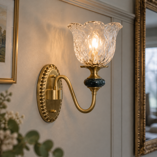 Modern indoor wall sconce mounted on panelled sitting room wall, shade held upright in its fitting casting a warm glow